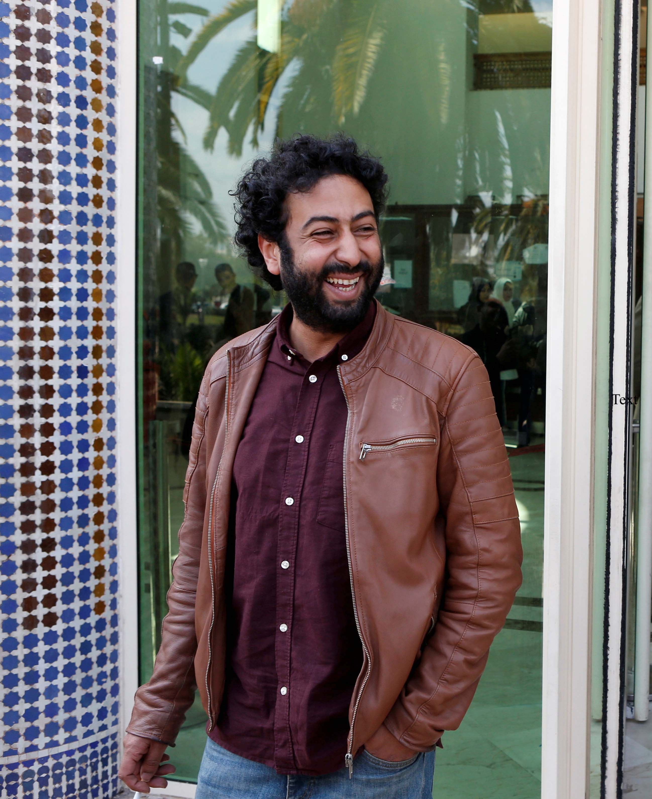 Journalist and activist Omar Radi waits outside the court in Casablanca, Morocco, March 12, 2020.