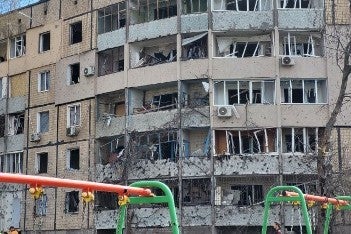 Damaged facade of an apartment building