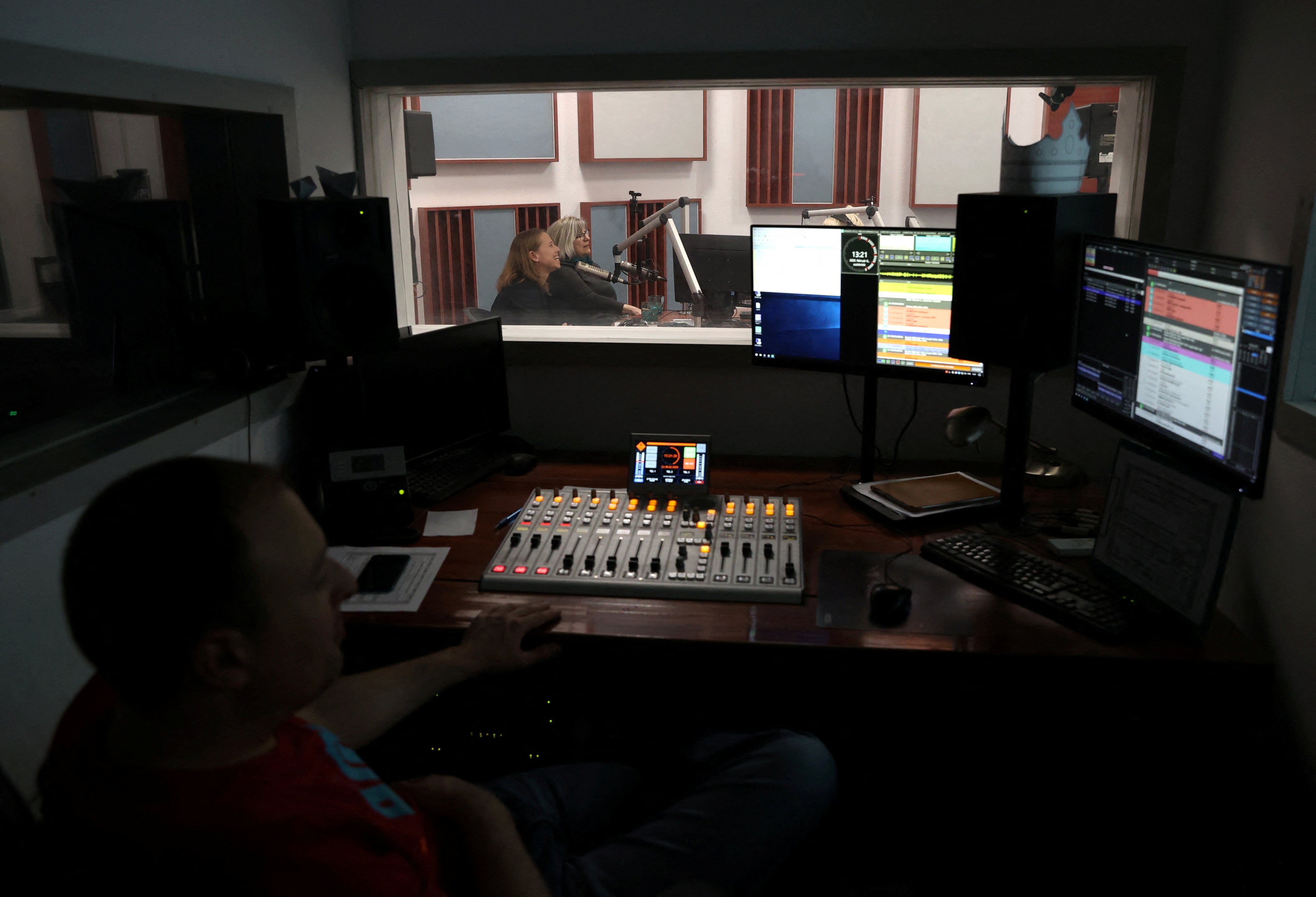 Employees of the Hungarian radio station Klubrádió work at its headquarters in Budapest, Hungary, February 6, 2025.