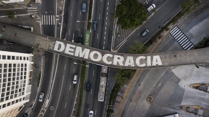 The word “democracy” on a pedestrian bridge in São Paulo, Brazil, October 26, 2022.