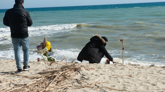 Relatives of a person who went missing after a migrant boat sank on February 26 on the beach near where the shipwreck took place off the coast of Steccato di Cutro, near Crotone, in Calabria in southern Italy. March 7, 2023. 