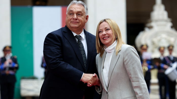 Italian Prime Minister Giorgia Meloni (R) welcomes Hungarian Prime Minister Viktor Orban in Rome, Italy, October 27, 2025.