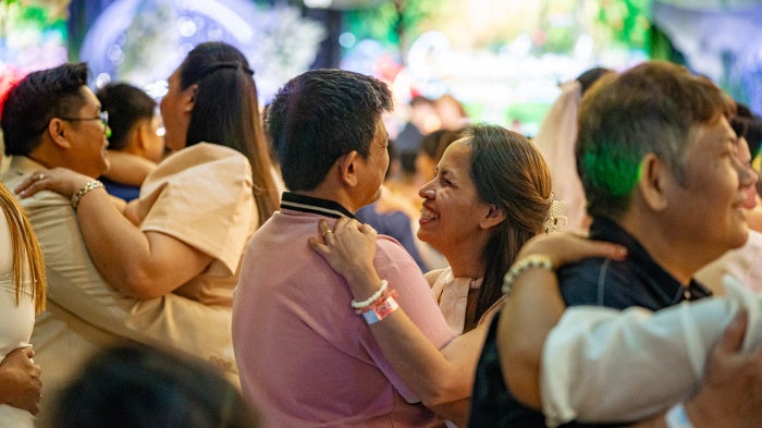 Same-sex couples share a slow dance after exchanging vows at a commitment ceremony in Quezon City, Philippines, on February 14, 2026. 
