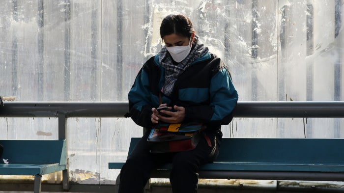 A person using their phone in Tehran, Iran on January 27, 2026.
