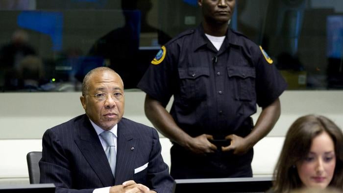 Charles Taylor sits at the defendant's table during his trial at the Special Court for Sierra Leone in The Hague, August 5, 2010.