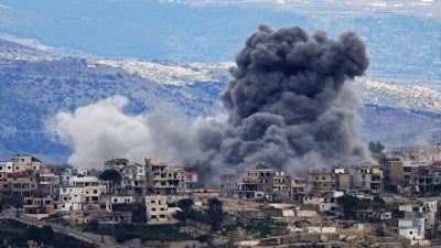 Smoke rises from an Israeli bombardment on the southern Lebanese village of Khiam on March 4, 2026.