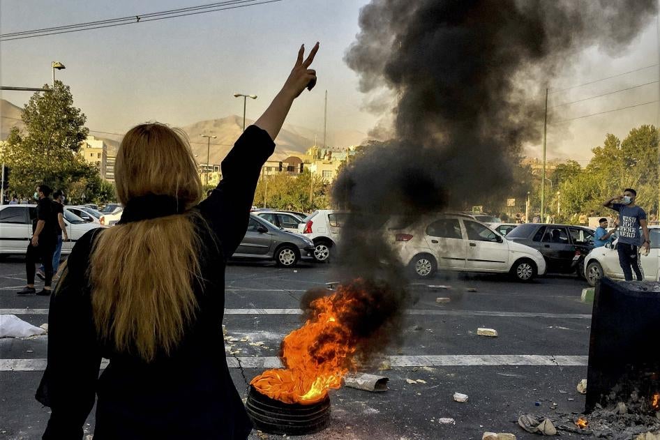 Iranians protests the death of 22-year-old Mahsa Amini after she was detained by the morality police, in Tehran, October 1, 2022.