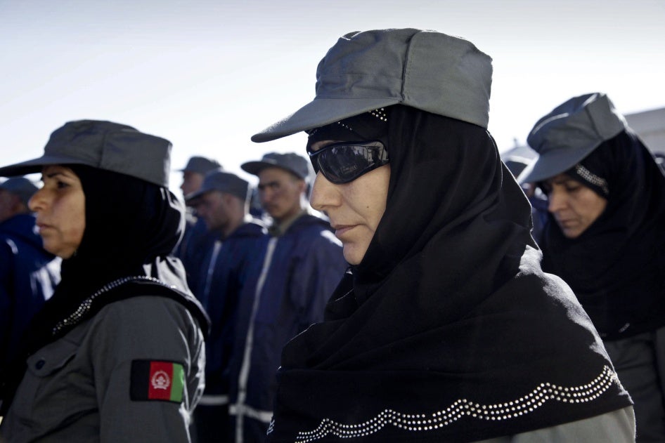 Afghan policewomen and policemen during their graduation ceremony