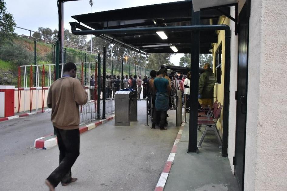 1)	Migrants registering at the Ceuta migrants center after arriving in the enclave, February 2017