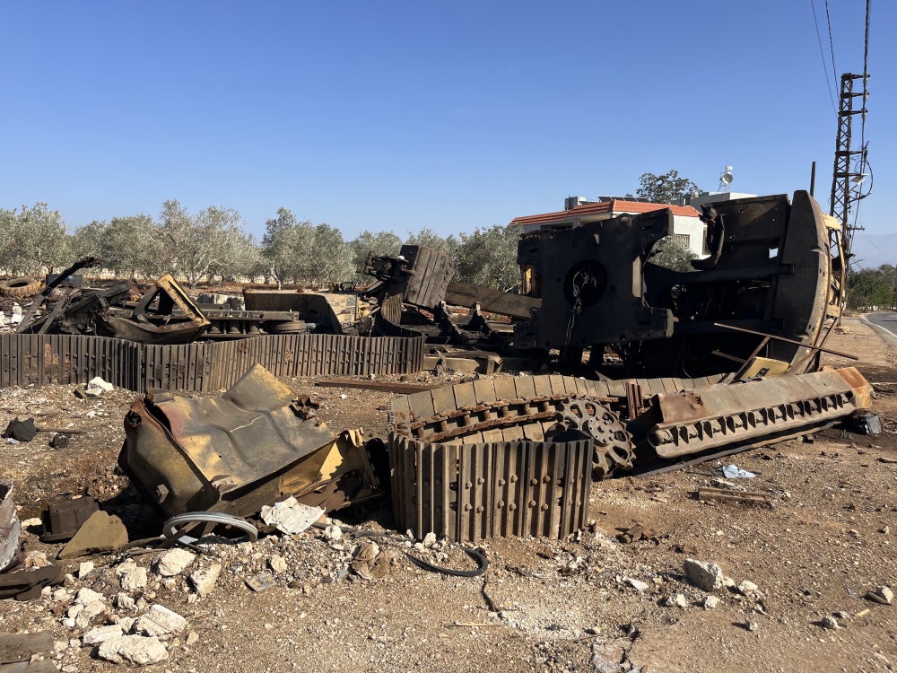 A destroyed excavator from Israeli strikes on August 6, 2025 on Deir Seryan, southern Lebanon.