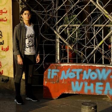 Rana, 32, standing in Riad El-Solh Square, one of the main protest sites in downtown Beirut. December 22, 2019. 