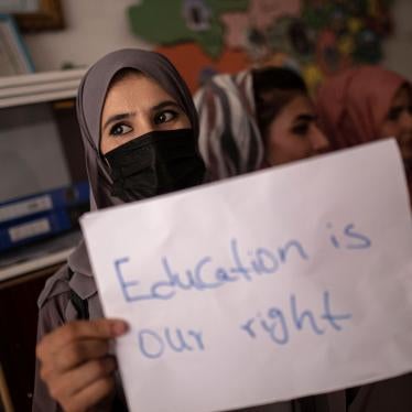 Women demonstrate for their rights during a gathering for National Teachers Day in Kabul, Afghanistan, October 5, 2021.