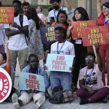 Vanessa Nakate, of Uganda, center, takes part in a protest against fossil fuels at the COP28 U.N. Climate Summit in Dubai, United Arab Emirates, December 5, 2023. 