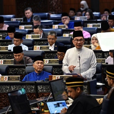 Malaysia’s Prime Minister and Finance Minister Anwar Ibrahim delivers the 2025 budget speech at parliament