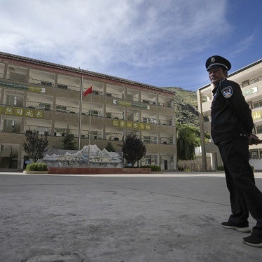 A security guard outside the Shangri-La Key School in Kardze prefecture, Sichuan province, China, September 5, 2023.