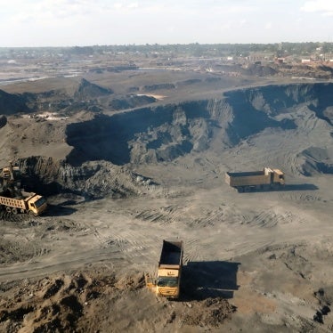 Trucks removing lead waste