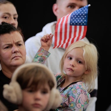 Some of the dozens of white South Africans who accepted an invitation from the Trump administration to come to the United States as refugees arrived at an air hangar near Washington Dulles International Airport in Virginia on May 12, 2025.