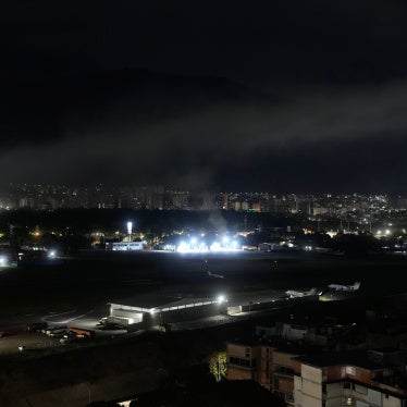 Smoke rises over an airport in Caracas, Venezuela