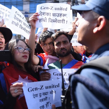 Nepali Gen Z activists hold banners which read "Don't Forget the Blood of Martyrs"
