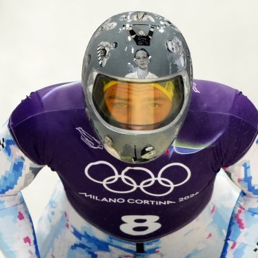 Ukraine’s Vladyslav Heraskevych wearing a helmet honoring Ukrainian athletes killed since Russia’s full-scale invasion of Ukraine during skeleton training at the 2026 Winter Olympics, Italy, February 9, 2026.