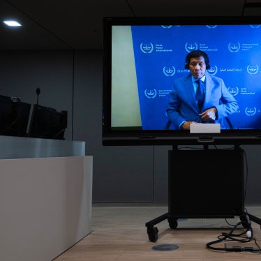 Former Philippine President Rodrigo Duterte is seen on a screen in the courtroom of the International Criminal Court, in The Hague, Netherlands, March 14, 2025.  