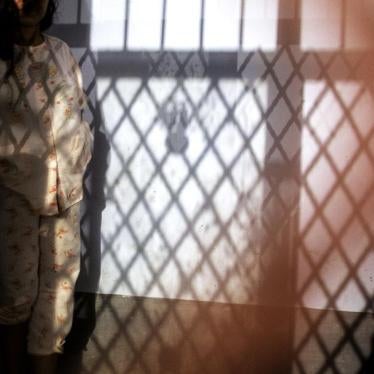 a woman at a healing center in Brebes, Indonesia 