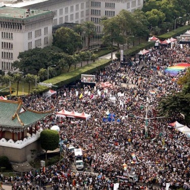 Participants hold rainbow flags at LGBT Pride Parade in Taipei, Taiwan on October 28, 2017. 
