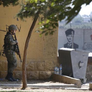 A Turkish soldier stands at the border with Syria in Akcakale, Sanliurfa province, southeastern Turkey, Thursday, Oct. 10, 2019. 