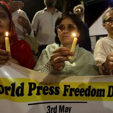 Pakistani journalists attend a candlelight vigil to observe World Press Freedom Day on May 3, 2019, in Karachi, Pakistan. © 2019 AP Photo/Fareed Khan